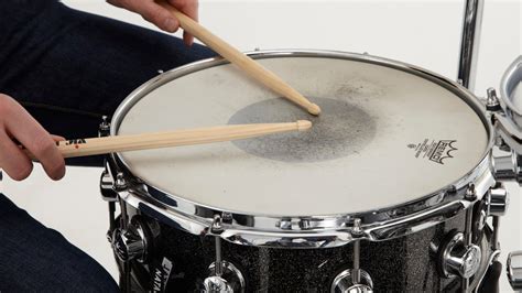 what is a snare in music and how does it relate to the concept of rhythm in poetry?